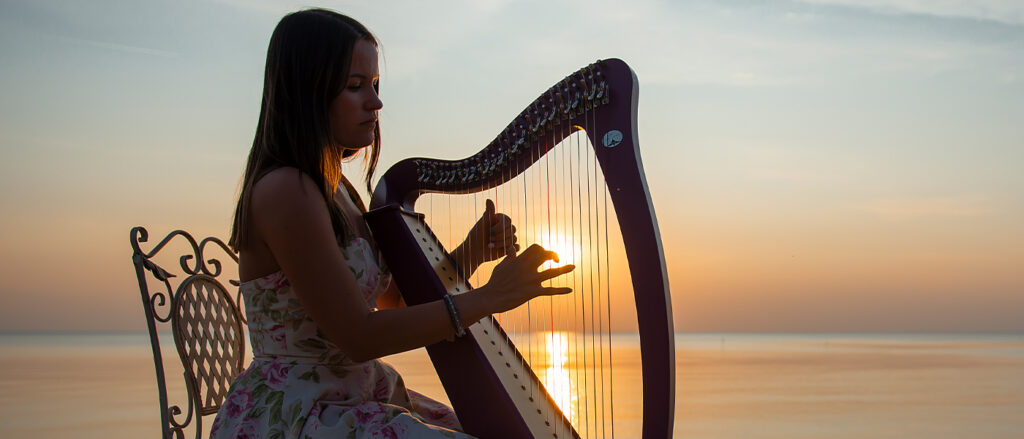 Strumming im Creative Healing in Analogie zu Harfe oder Kontrabass